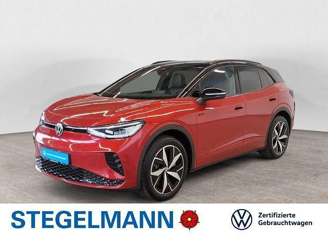 Kings red metallic Gebraucht 2025 VW ID.4 GTX SUV | 42.690 € (Guter Preis) - Bild 1/4