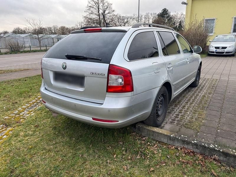 Second-hand Skoda Octavia Elegance 140 CP (102 kW) 2013 Argintiu Break