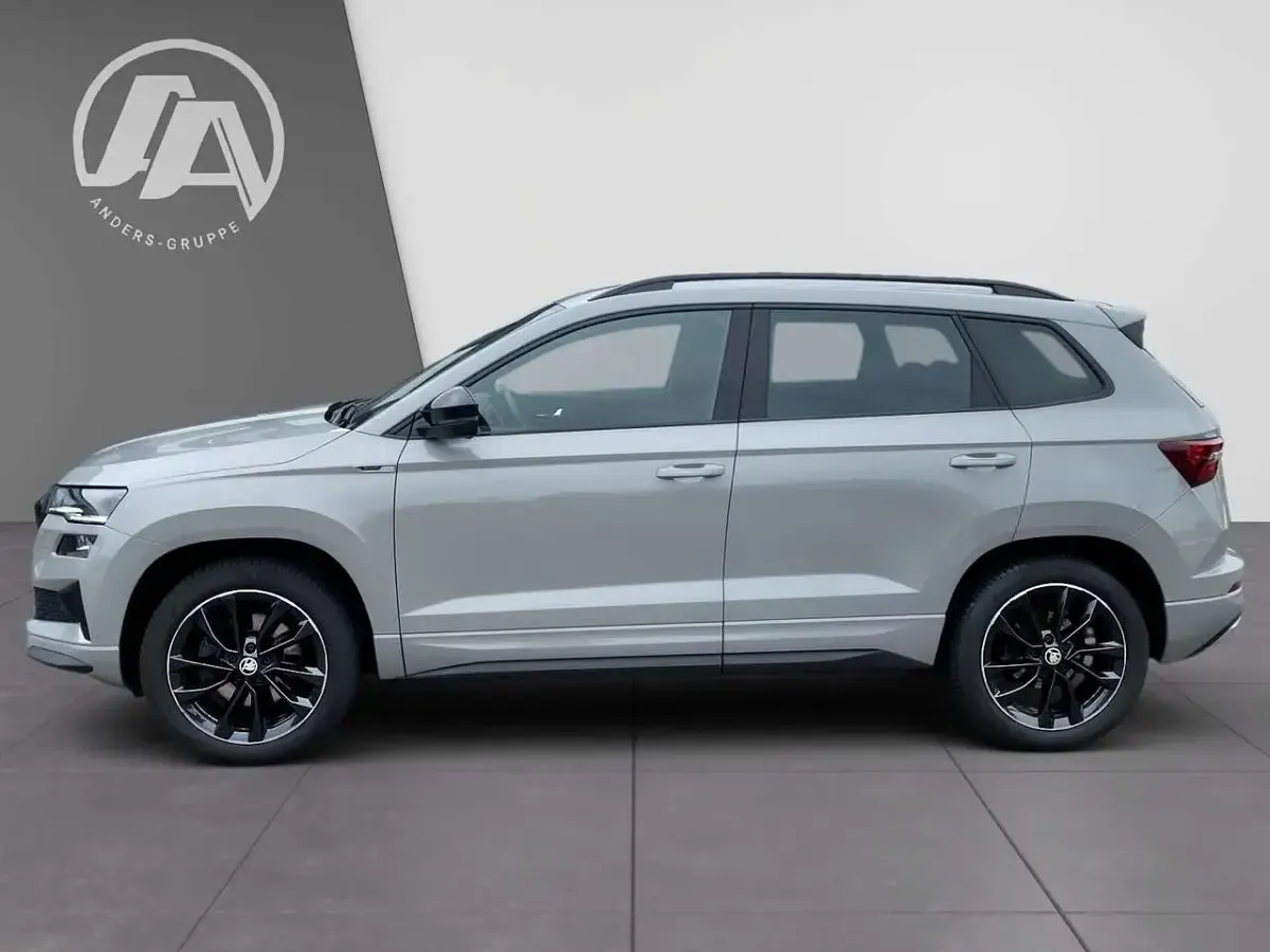 Gebraucht Skoda Karoq SportLine 190 PS (139 kW) 2023 Steel grau SUV
