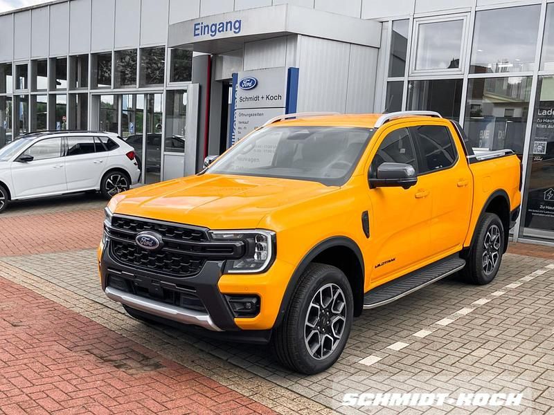 Cyber orange (orange) Gebraucht 2026 Ford Ranger Wildtrack Abholung | 48.950 € (Fairer Preis) - Bild 1/4