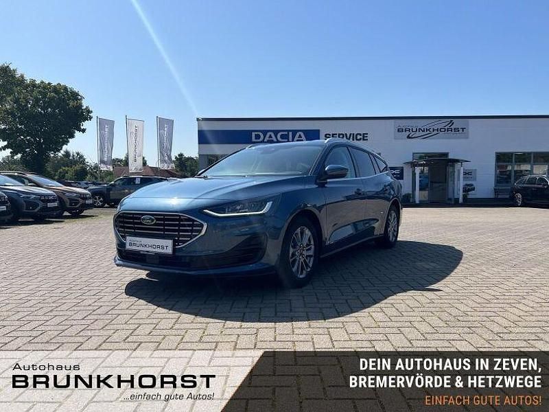 Blau (chrome blue) Gebraucht 2024 Ford Focus Titanium X Kombi | 22.490 € (Guter Preis) - Bild 1/3