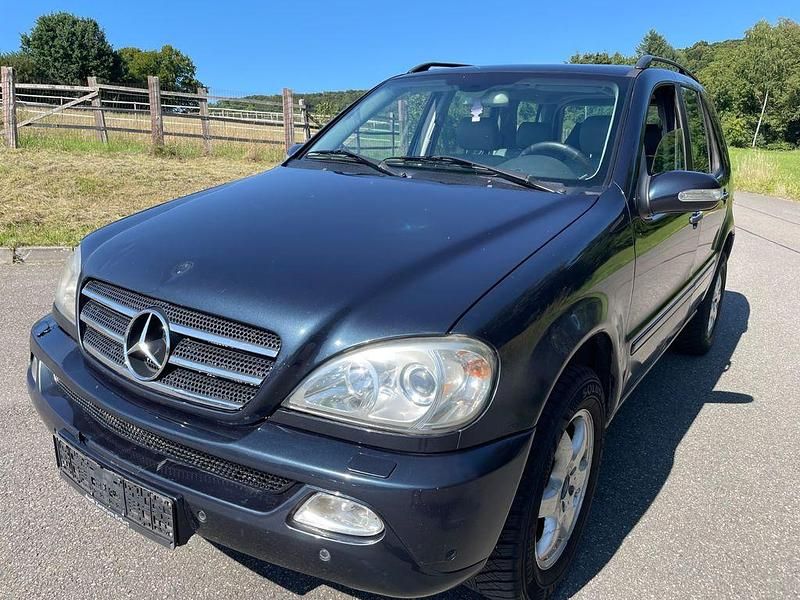 Schwarz Gebraucht 2004 Mercedes ML400 SUV | 3.390 € - Bild 1/4