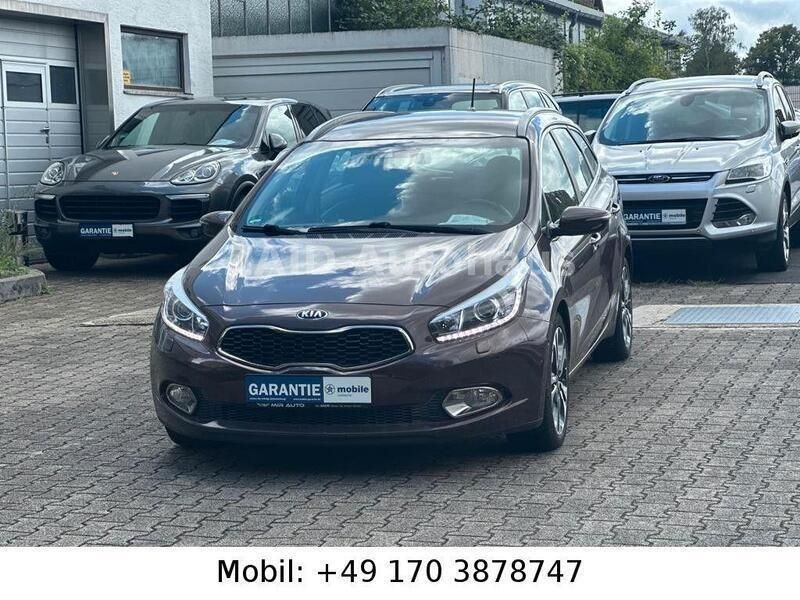 Braun Gebraucht 2012 Kia Ceed Kombi | 9.999 € (Teuer) - Bild 1/4
