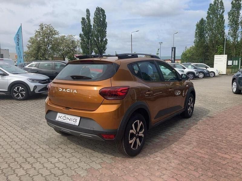 Gebraucht Dacia Sandero Expression 91 PS (66 kW) 2023 Taklamakanorange metallic Kleinwagen
