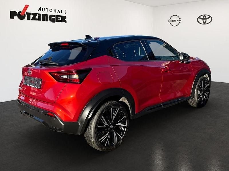 Gebraucht Nissan Juke 114 PS (83 kW) 2021 Fuji sunset red / black SUV