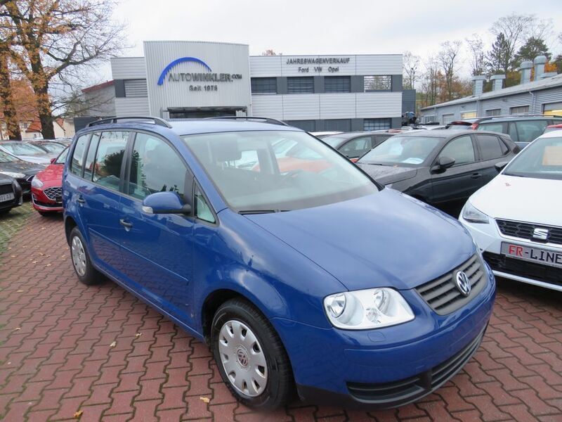 Grau Gebraucht 2007 VW Touran Conceptline Van / Kleinbus | 5.990 € (Teuer) - Bild 1/4
