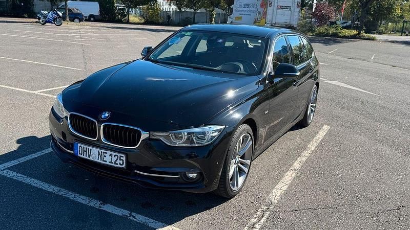 Schwarz Gebraucht 2013 BMW 330 Sport Line Kombi | 9.999 € (Guter Preis) - Bild 1/4
