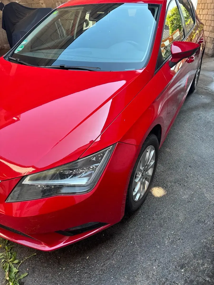 Używany Seat Leon 110 KM (80 kW) 2015 Czerwony Hatchback