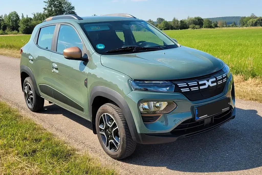 Gebraucht Dacia Spring Extreme 47 kW (65 PS) 2024 Grün Kleinwagen