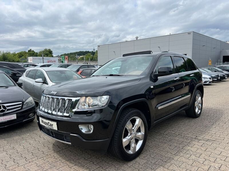 Brilliant black crystal pearl Gebraucht 2012 Jeep Grand Cherokee SUV | 13.990 € (Fairer Preis) - Bild 1/4