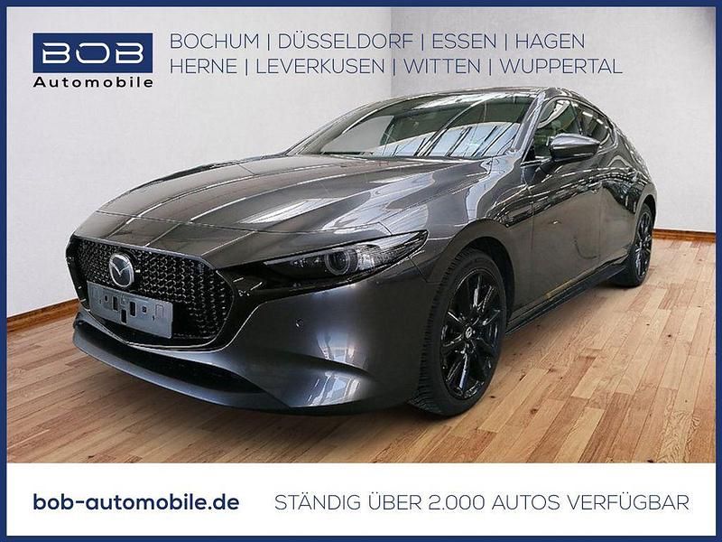 Grau Gebraucht 2024 Mazda 3 Exclusive-Line Limousine | 27.410 € (Fairer Preis) - Bild 1/3