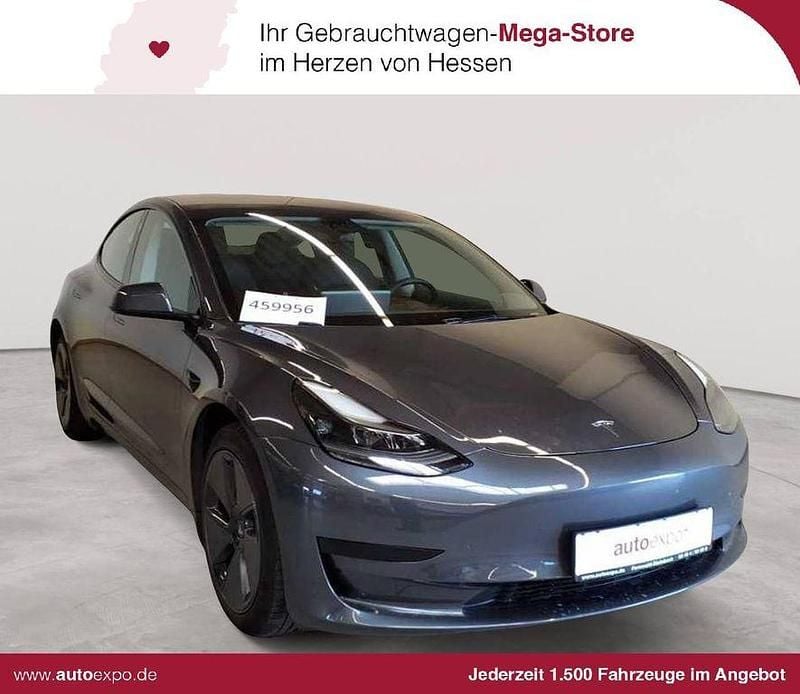 Grau Gebraucht 2021 Tesla Model 3 Standard Range Plus Limousine | 21.989 € (Guter Preis) - Bild 1/4