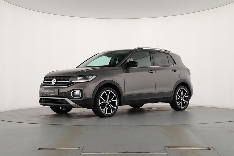 Limestone grey metallic Gebraucht 2019 VW T-Cross Style SUV | 18.489 € (Fairer Preis) - Bild 1/4
