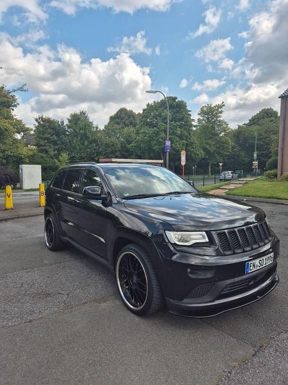 Schwarz Gebraucht 2014 Jeep Grand Cherokee Summit SUV | 19.299 € (Fairer Preis) - Bild 1/4