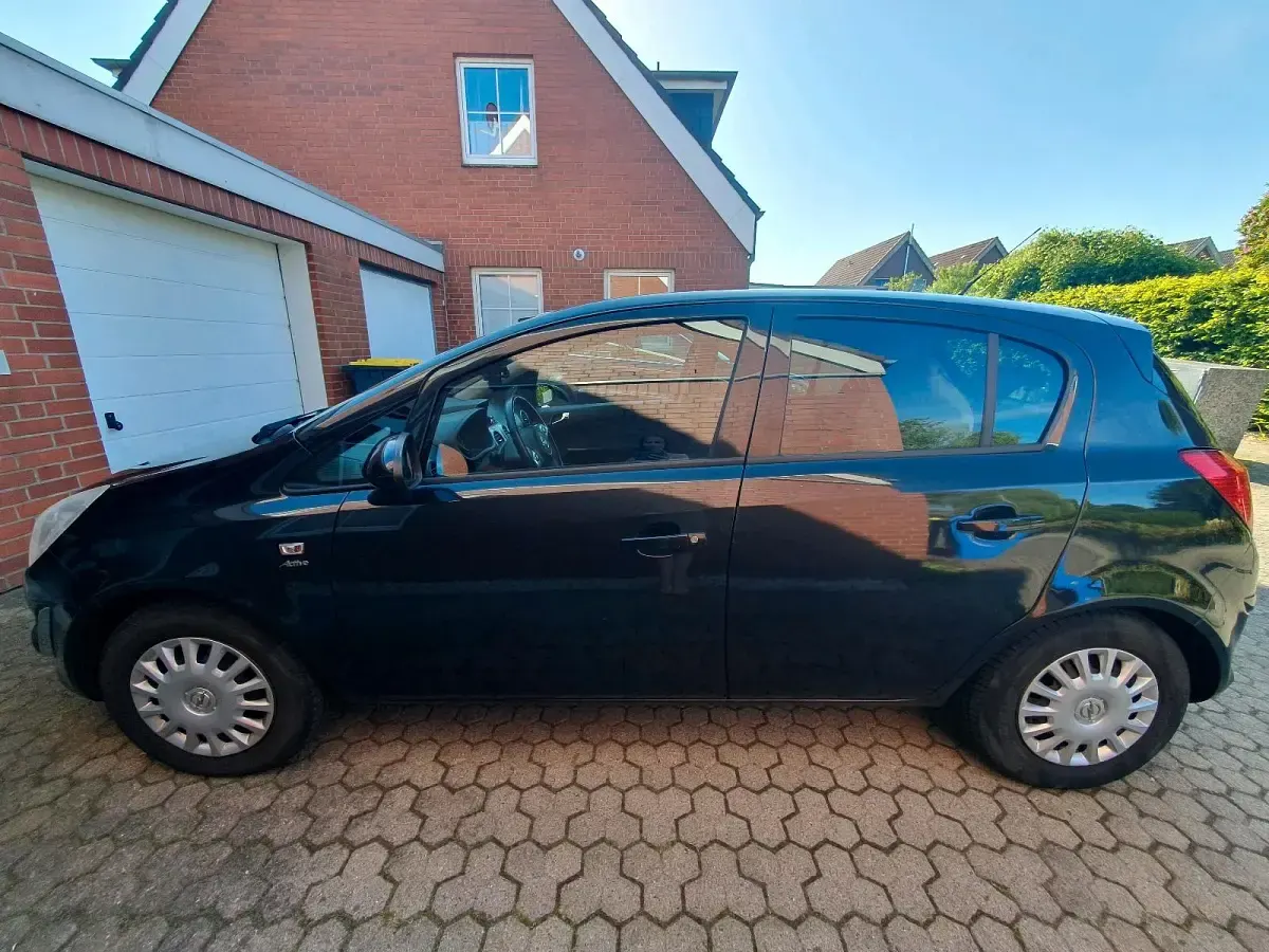 Gebraucht Opel Corsa 101 PS (74 kW) 2013 Schwarz Kleinwagen