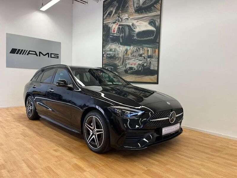 Obsidianschwarz metalliclack Gebraucht 2023 Mercedes C300e AMG line Kombi | 42.840 € (Fairer Preis) - Bild 1/4