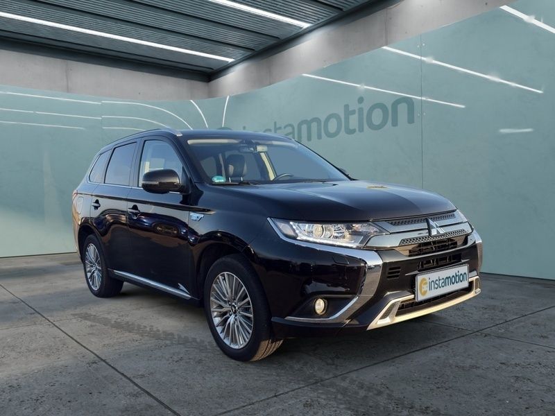 Schwarz Gebraucht 2021 Mitsubishi Outlander P-HEV Basis Limousine | 25.990 € (Fairer Preis) - Bild 1/3