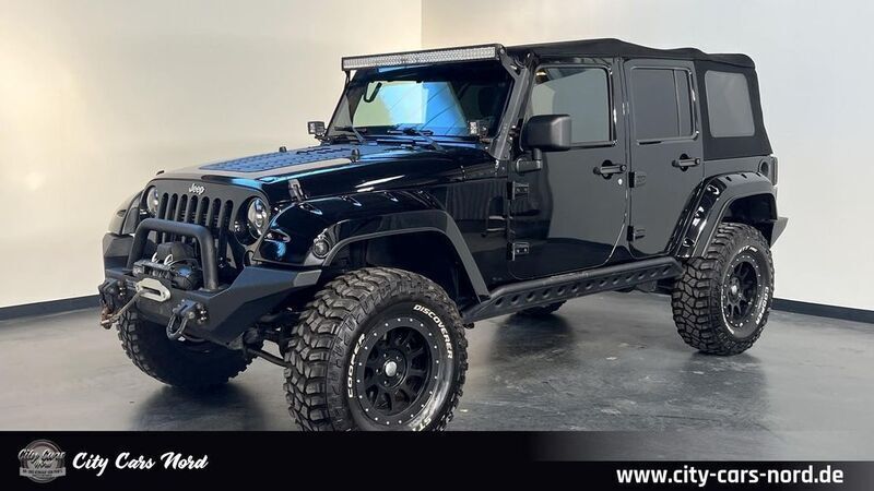 Schwarz Gebraucht 2011 Jeep Wrangler Unlimited Sahara SUV | 39.999 € - Bild 1/4