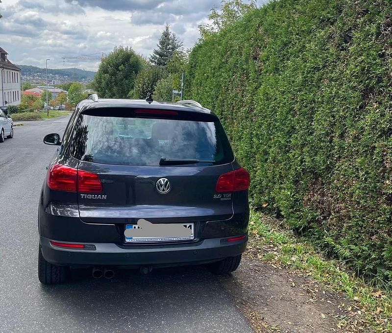 Grau Gebraucht 2015 VW Tiguan LOUNGE SUV | 12.400 € (Fairer Preis) - Bild 1/4