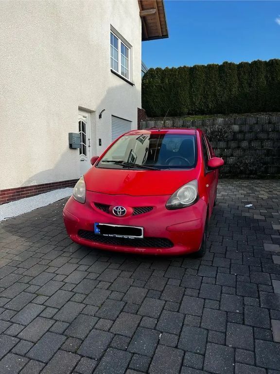 Rot Gebraucht 2006 Toyota Aygo Kleinwagen | 1.150 € (Superpreis) - Bild 1/4
