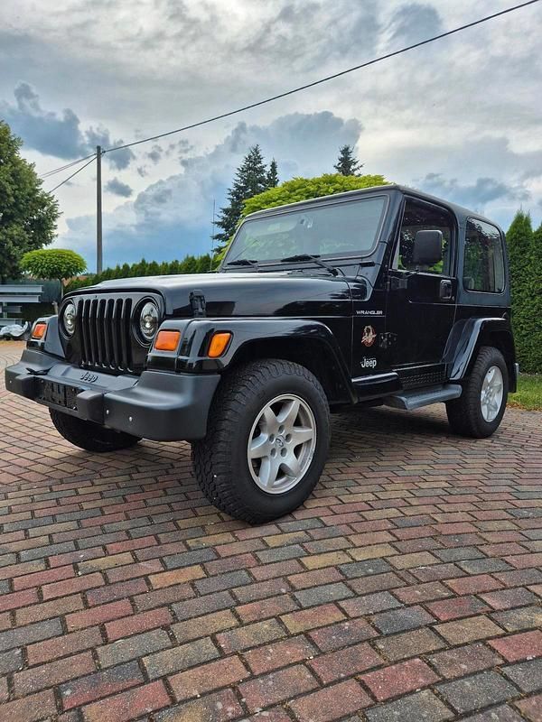 Schwarz Gebraucht 2002 Jeep Wrangler Sahara SUV | 14.800 € (Superpreis) - Bild 1/4