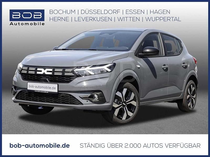 Dolomitgrau (grau) Neu 2025 Dacia Sandero Journey Kleinwagen | 21.120 € (Fairer Preis) - Bild 1/3