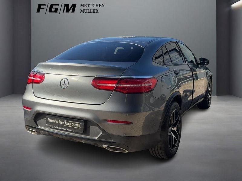 Gebraucht Mercedes GLC250 AMG line 211 PS (155 kW) 2019 Metalliclack selenitgrau Coupé