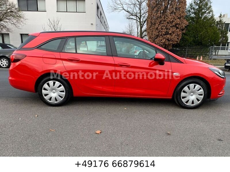 Lava rot Gebraucht 2019 Opel Astra Selection Kombi | 6.399 € (Superpreis) - Bild 1/4