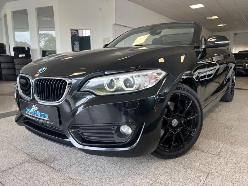 Black sapphire metallic Gebraucht 2017 BMW 220 Advantage Cabrio | 9.999 € (Fairer Preis) - Bild 1/4