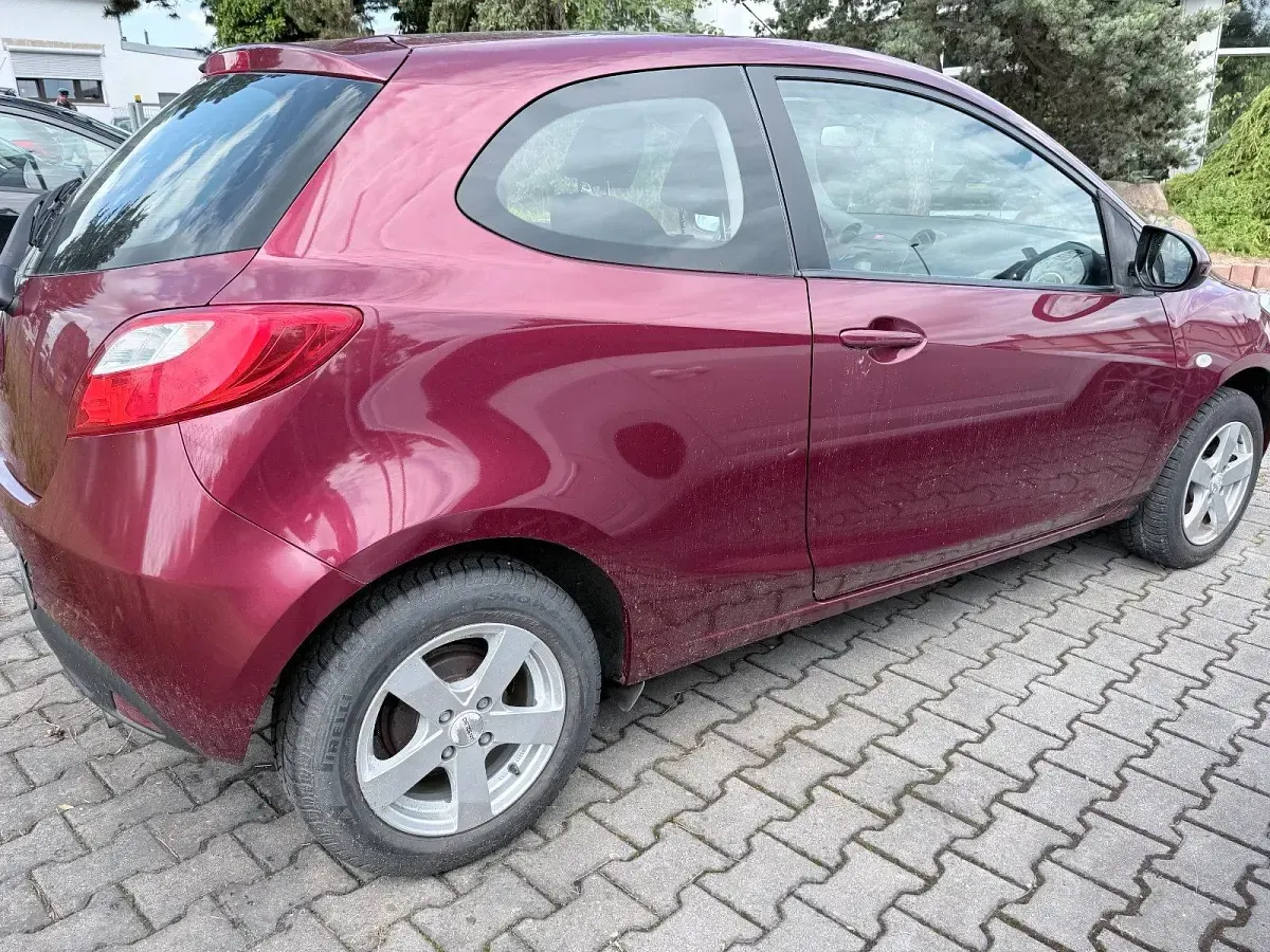 Gebraucht Mazda 2 84 PS (61 kW) 2011 Rot Kleinwagen