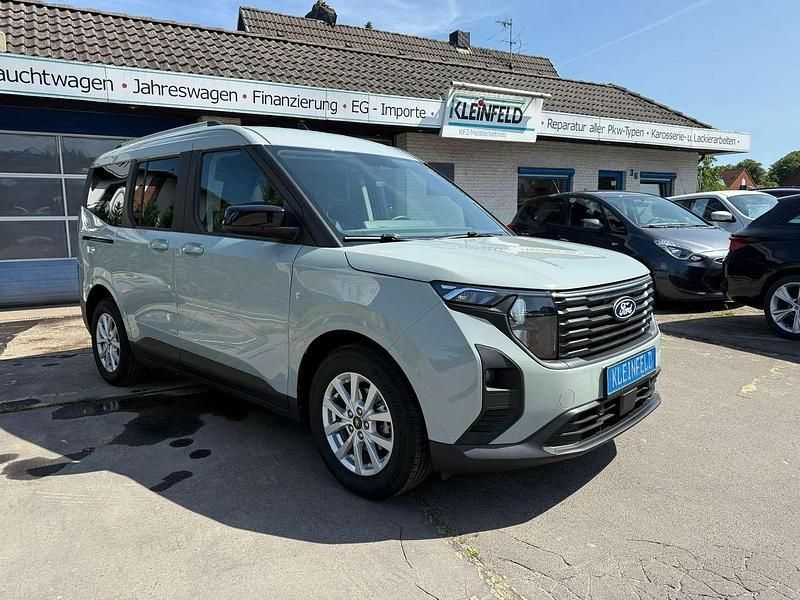 Cactus grey Gebraucht 2024 Ford Tourneo Courier Titanium Van / Kleinbus | 22.890 € (Guter Preis) - Bild 1/4