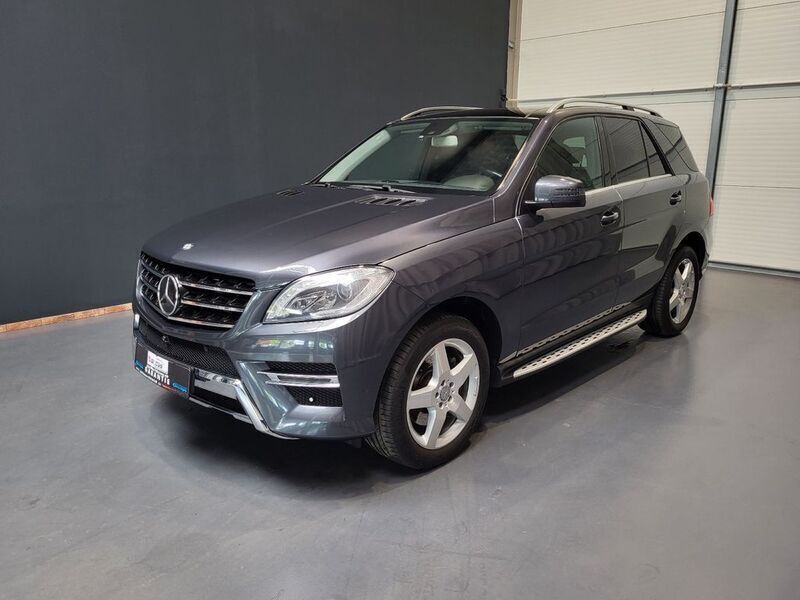 Grau Gebraucht 2013 Mercedes ML350 AMG SUV | 22.950 € (Fairer Preis) - Bild 1/4