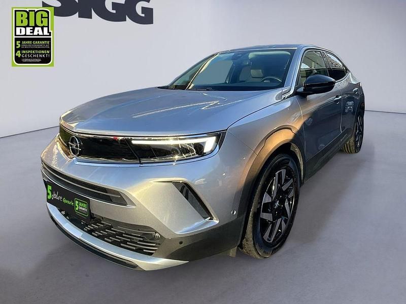 Gebraucht Opel Mokka Elegance 131 PS (96 kW) 2022 Kontrast grau/quarz silber SUV