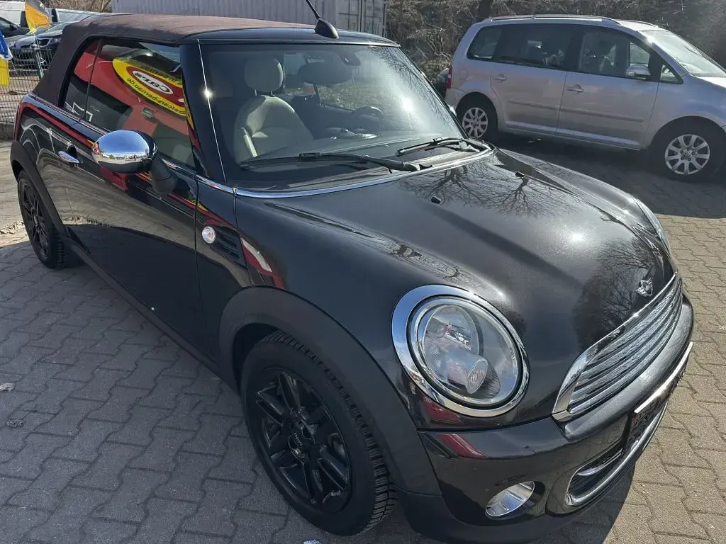 Gebraucht Mini Cooper Cabriolet 122 PS (89 kW) 2015 Iced chocolate (metallic) Cabrio