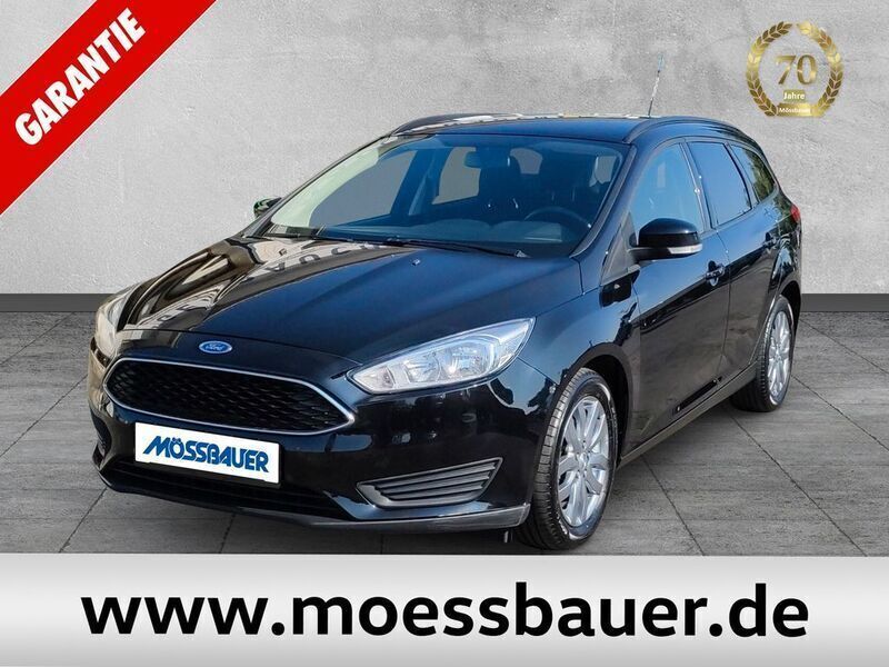 Schwarz Gebraucht 2015 Ford Focus Trend Limousine | 8.895 € (Fairer Preis) - Bild 1/4