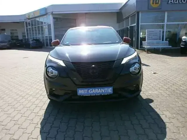 Gebraucht Nissan Juke Tekna 114 PS (83 kW) 2021 Black / sunset red (metallic) SUV