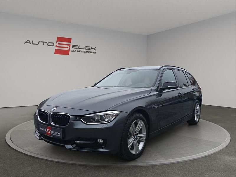 Grau Gebraucht 2014 BMW 318 Sport Line Kombi | 12.950 € (Teuer) - Bild 1/4