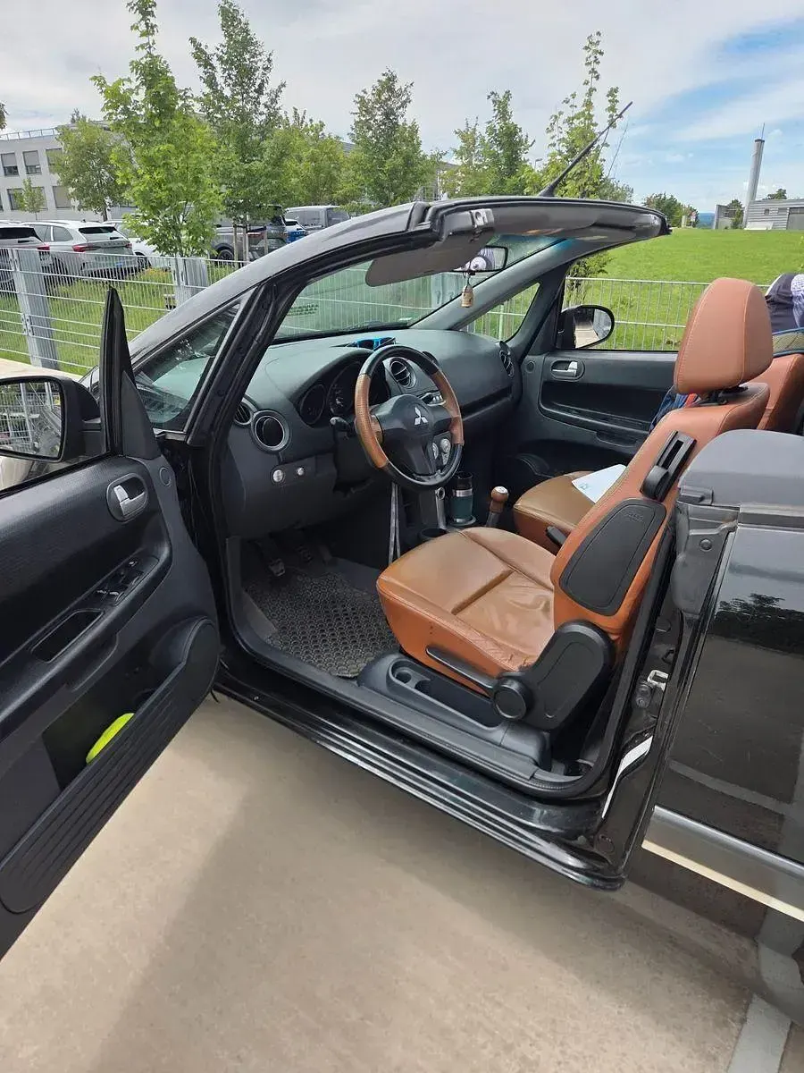 Gebraucht Mitsubishi Colt 109 PS (80 kW) 2006 Schwarz Cabrio