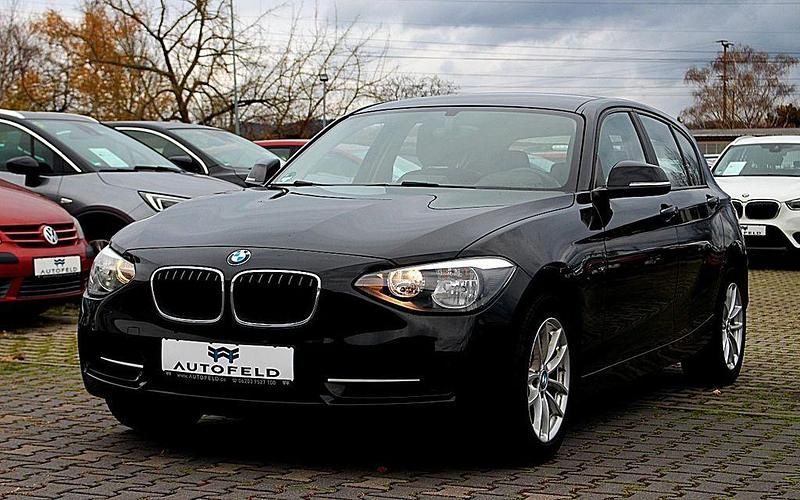 Schwarz Gebraucht 2013 BMW 116 Sport Line Kleinwagen | 8.800 € (Fairer Preis) - Bild 1/4