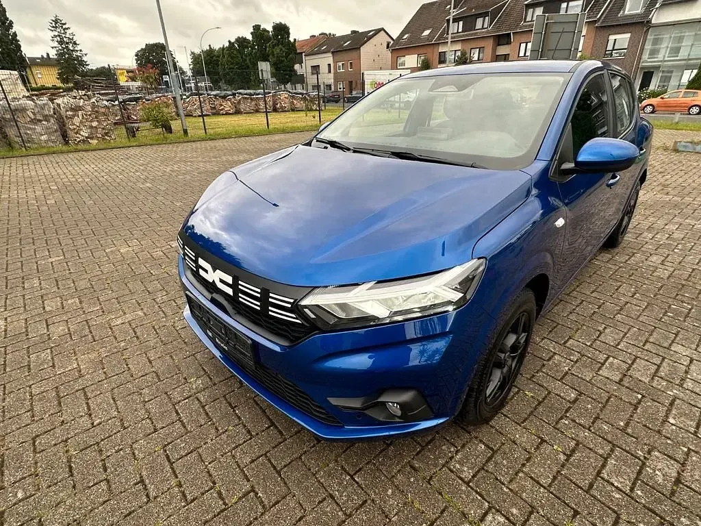 Gebraucht Dacia Sandero Expression 91 PS (66 kW) 2024 Blau Limousine