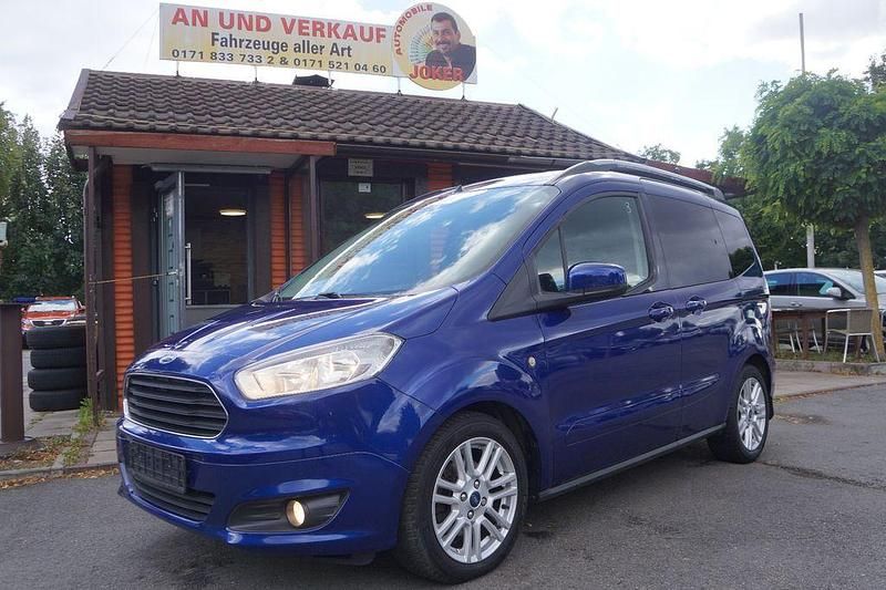 Blau Gebraucht 2017 Ford Tourneo Courier Titanium Van / Kleinbus | 6.990 € (Superpreis) - Bild 1/4