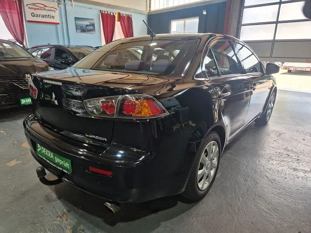 Begagnad Mitsubishi Lancer 117 HK (86 kW) 2015 Svart Sedan