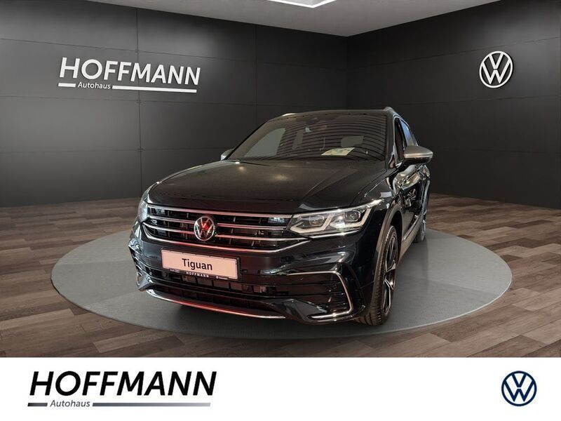 Schwarz Gebraucht 2024 VW Tiguan Allspace R-line SUV | 55.990 € - Bild 1/4