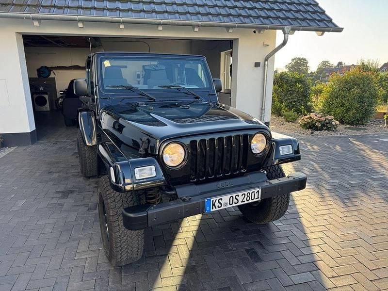 Schwarz Gebraucht 2005 Jeep Wrangler Sahara SUV | 26.800 € (Fairer Preis) - Bild 1/4