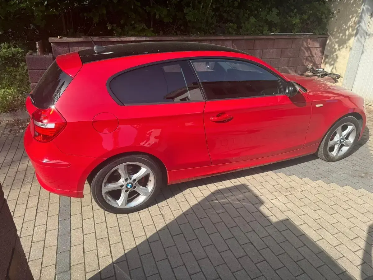 Gebraucht BMW 116 122 PS (89 kW) 2010 Rot Kleinwagen