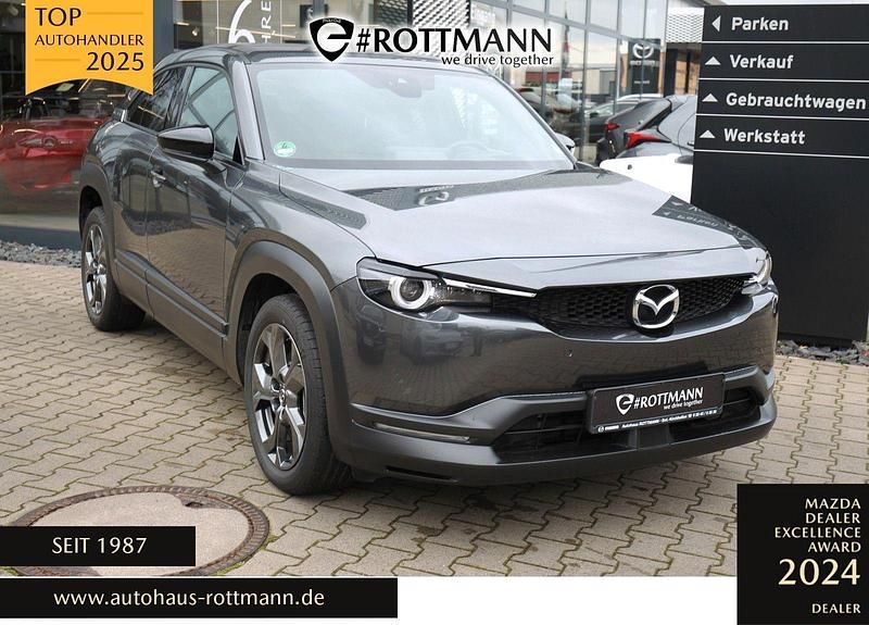 Grau Gebraucht 2021 Mazda MX30 Ad'Vantage SUV | 13.900 € (Superpreis) - Bild 1/4