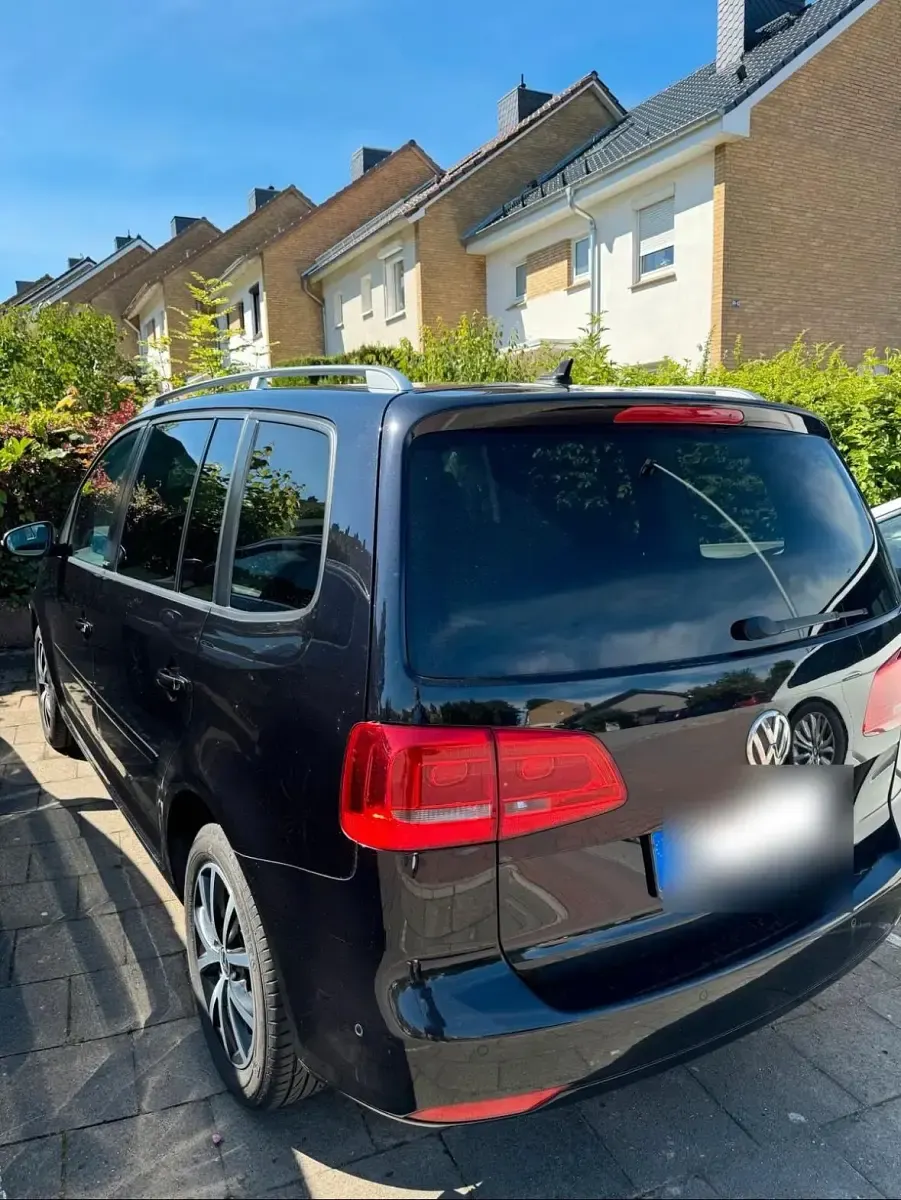 Gebraucht VW Touran 105 PS (77 kW) 2012 Schwarz Van / Kleinbus