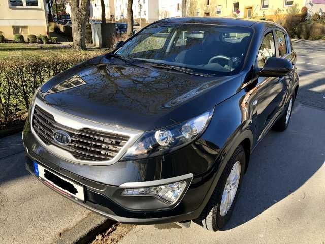 Schwarz metallic Gebraucht 2011 Kia Sportage Attract SUV | 9.999 € (Fairer Preis) - Bild 1/4