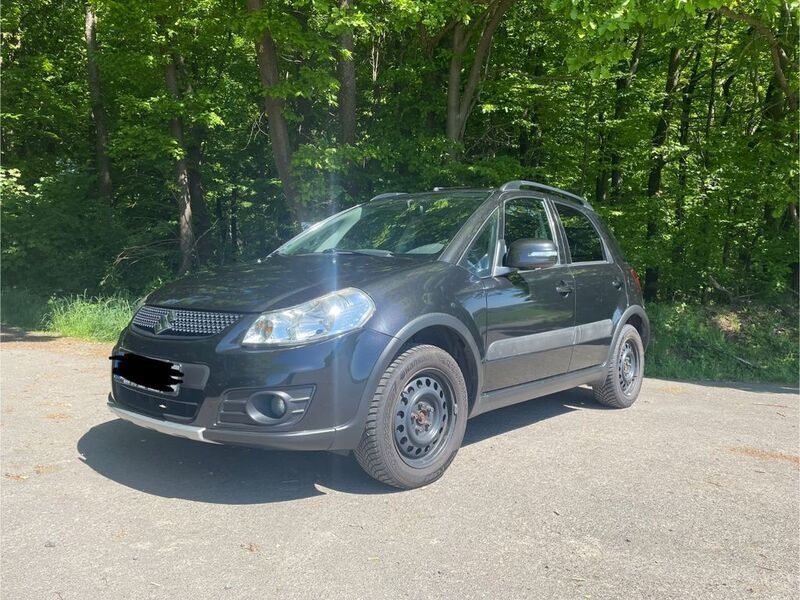 Schwarz Gebraucht 2013 Suzuki SX4 Style Limousine | 6.500 € (Fairer Preis) - Bild 1/4