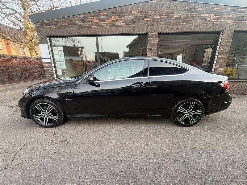 Gebraucht Mercedes C180 AMG 156 PS (114 kW) 2014 Schwarz Coupé